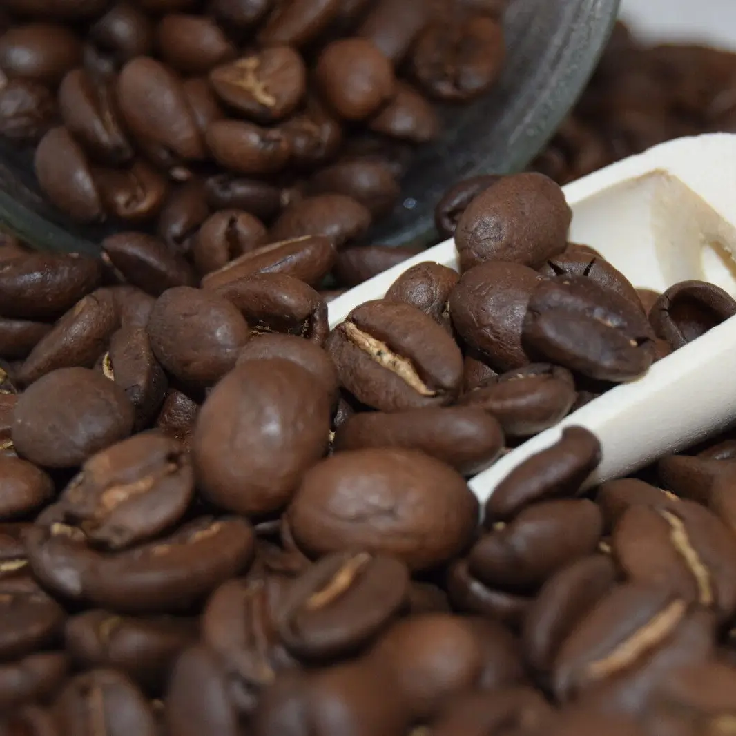 A bag of dark roast coffee beans from Sumatra.