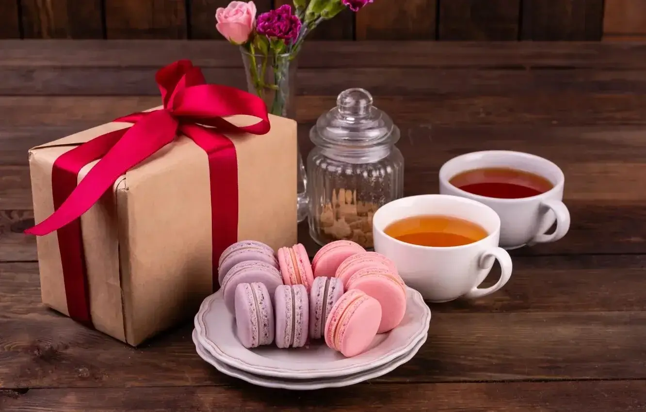 An open subscription box showing coffee bags and a descriptive card.